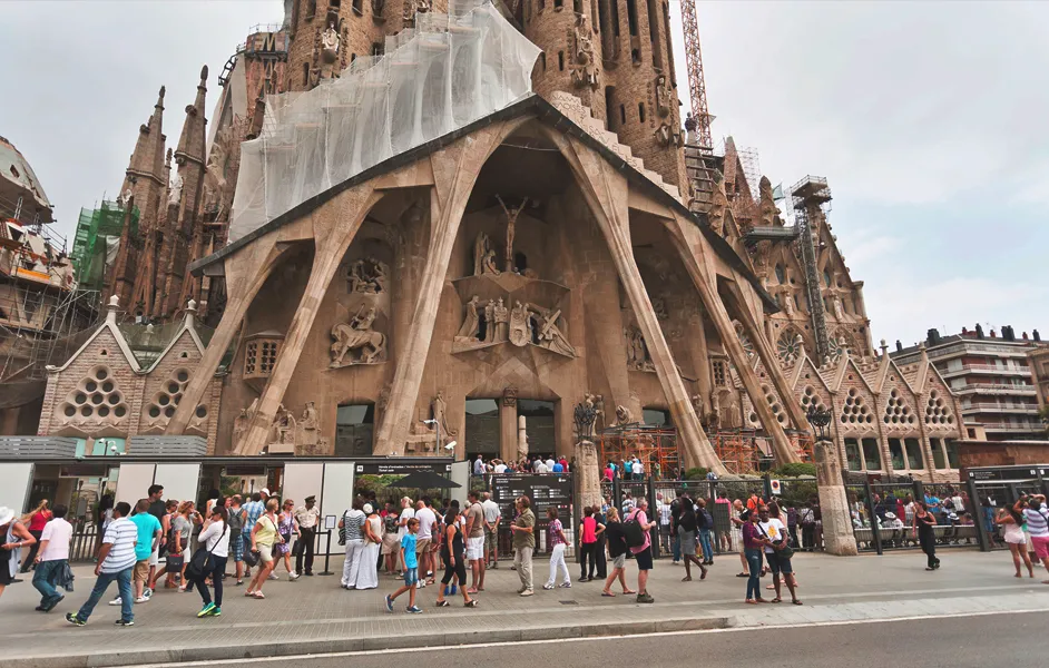 Where to Find Sagrada Familia Tickets - People standing at the entrance for ticket