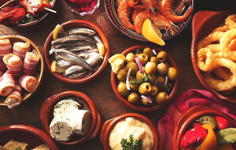 best tapas near sagrada familia - Tapas dishes in restaurant table